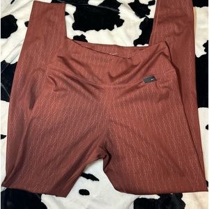 Nike size small maroon patterned leggings